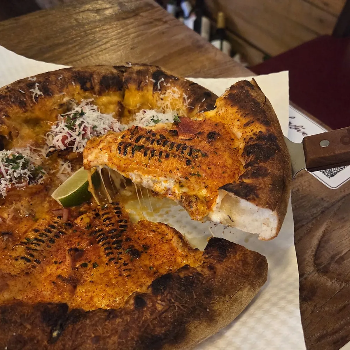 Half-and-half pizza with corn and taco halves