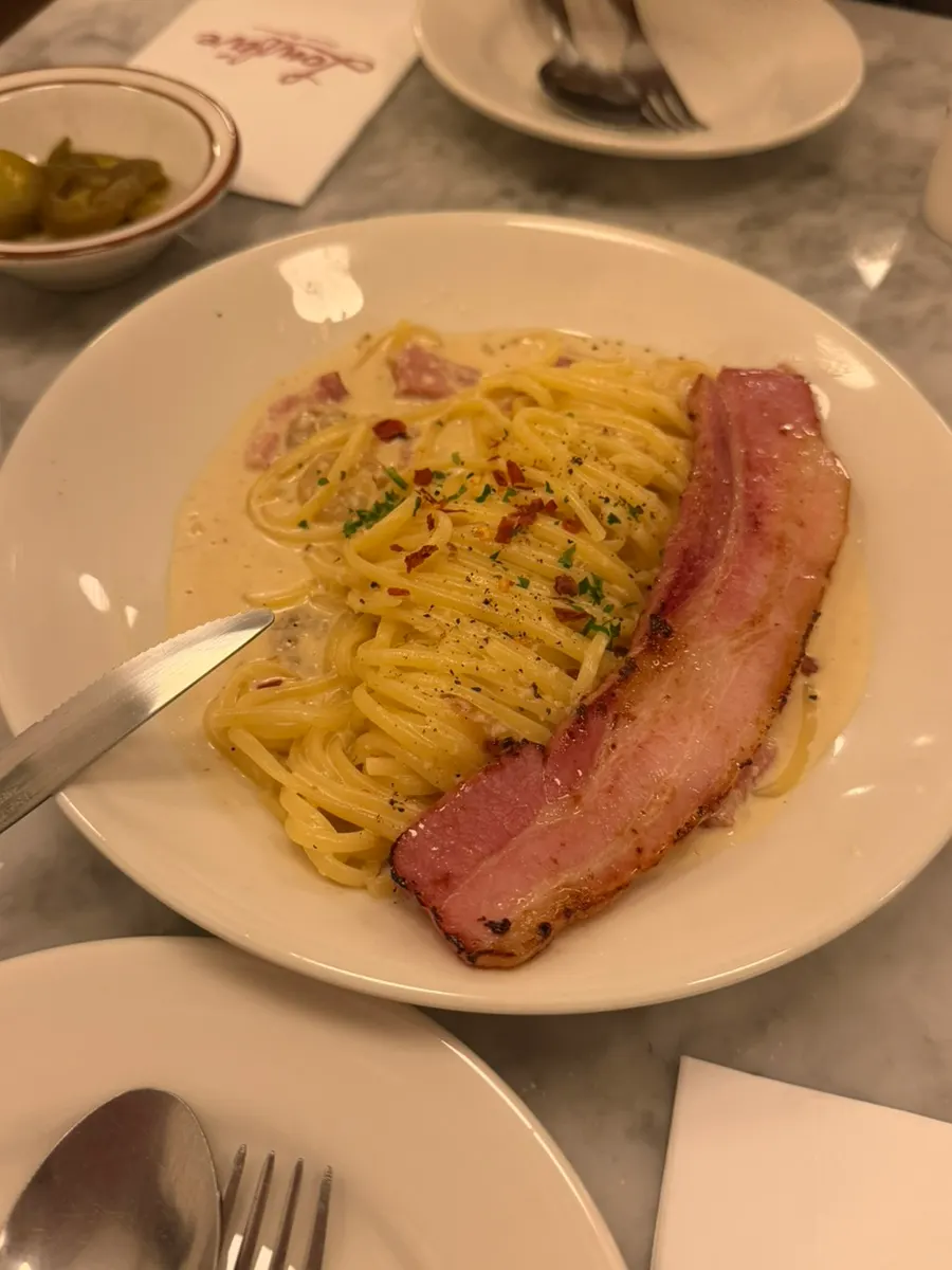 Alfredo cream pasta on the table