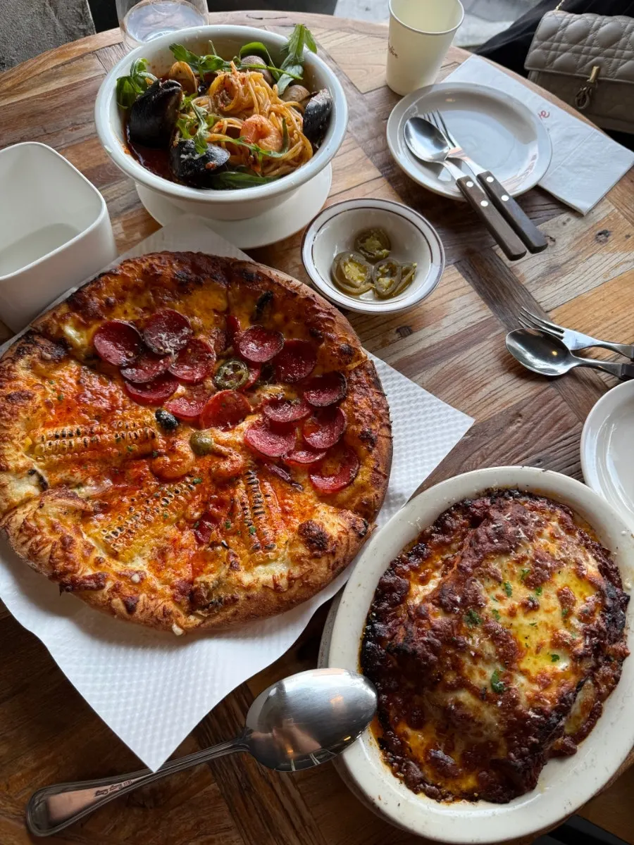 Half-and-half pizza and hot pot pescatore pasta spread