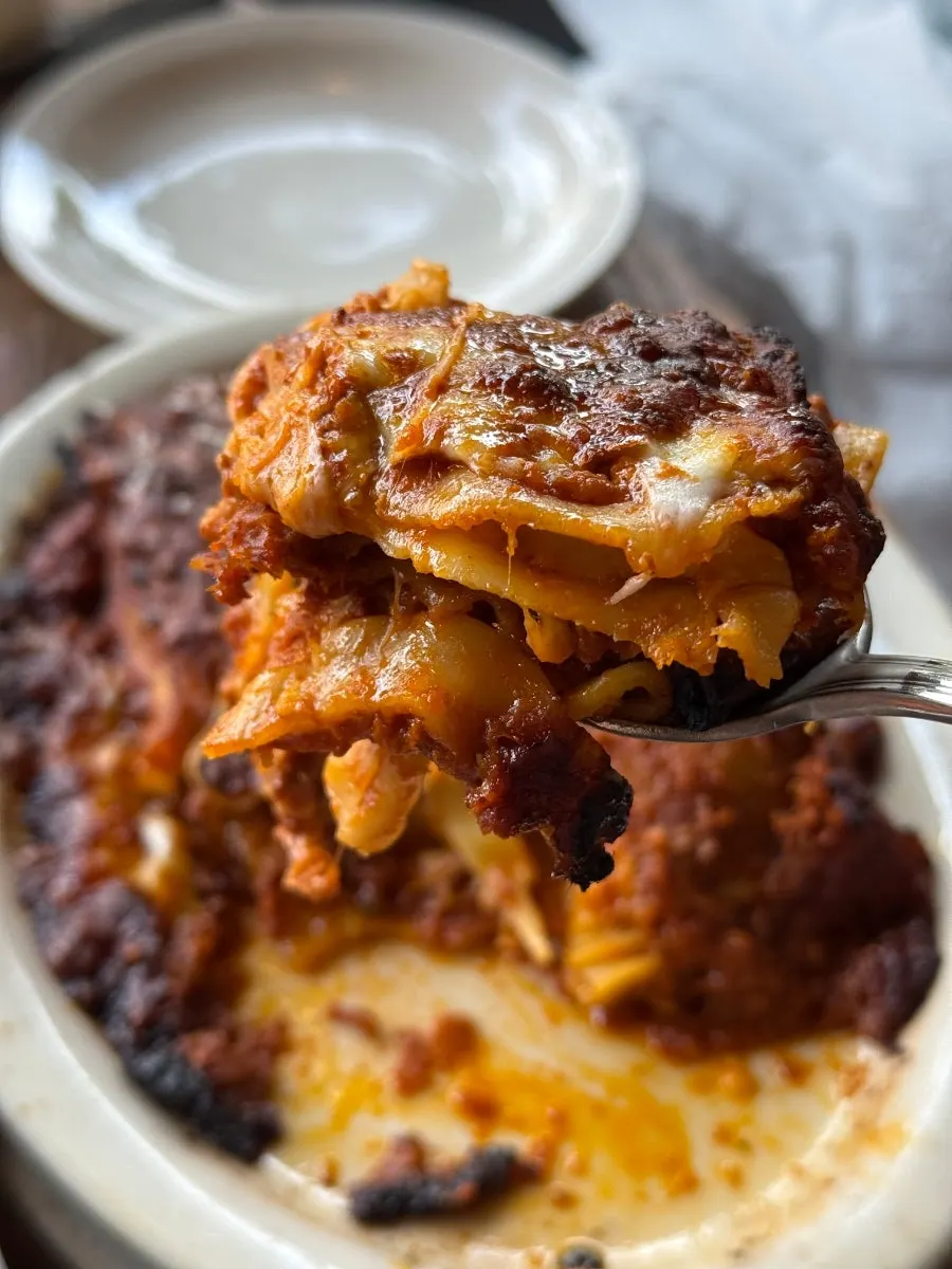 Slice of cheesy corn pizza