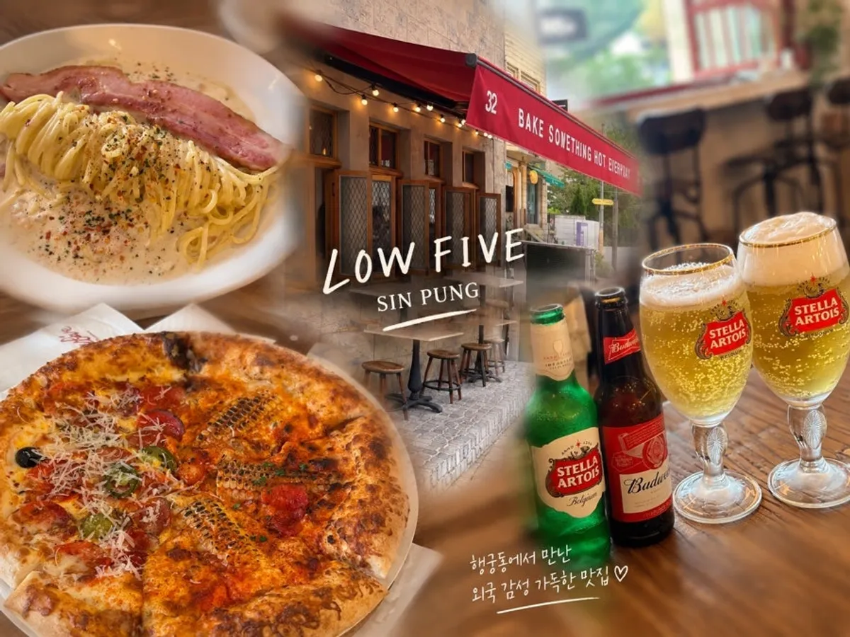 Spread of half-and-half pizza and beer at Low Five Sinpung
