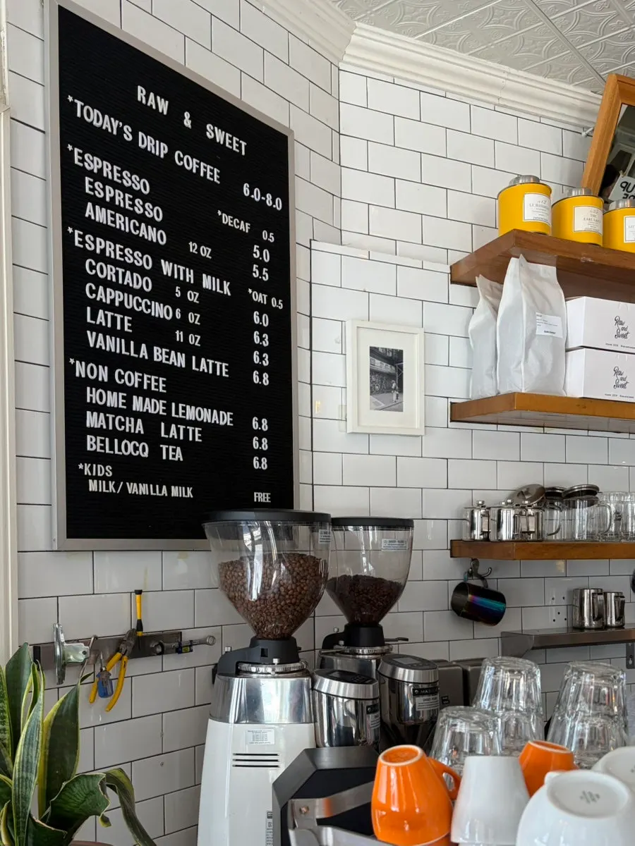 Egg tart placed next to coffee