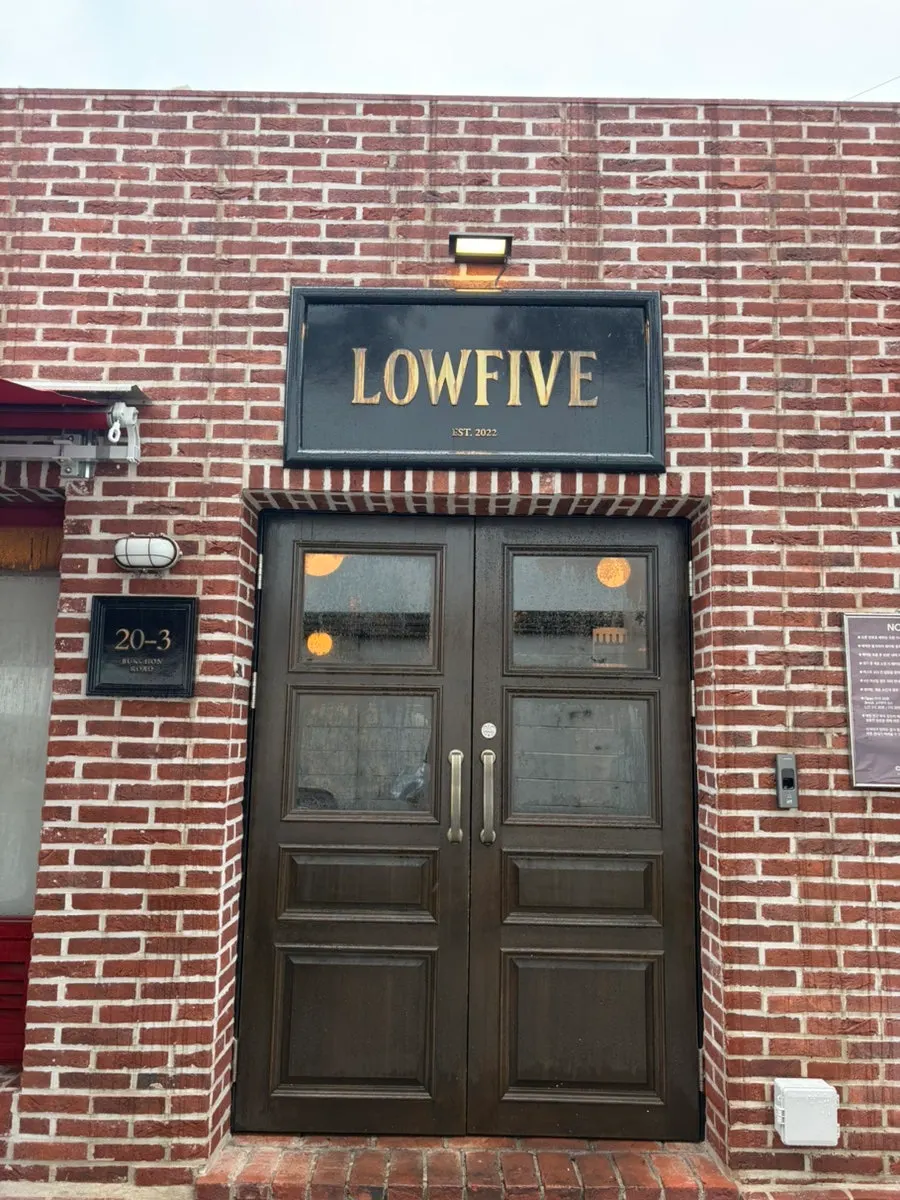 Vertical photo of the Low Five Anguk storefront