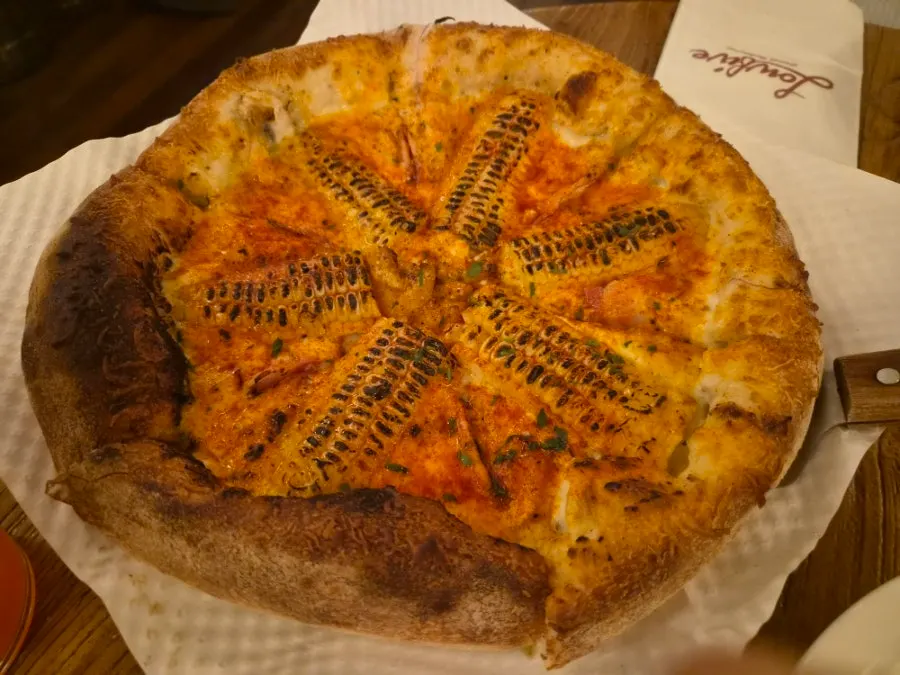 Close-up of the corn-topped pizza