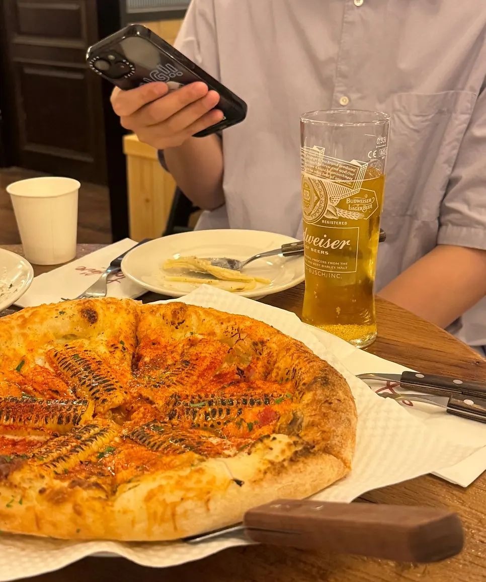 Dinner table with beer and the full meal