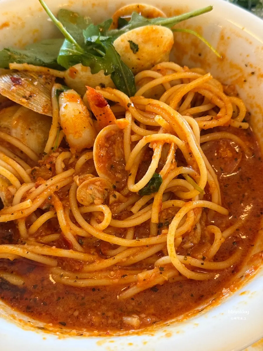 Pasta noodles lifted up with a fork