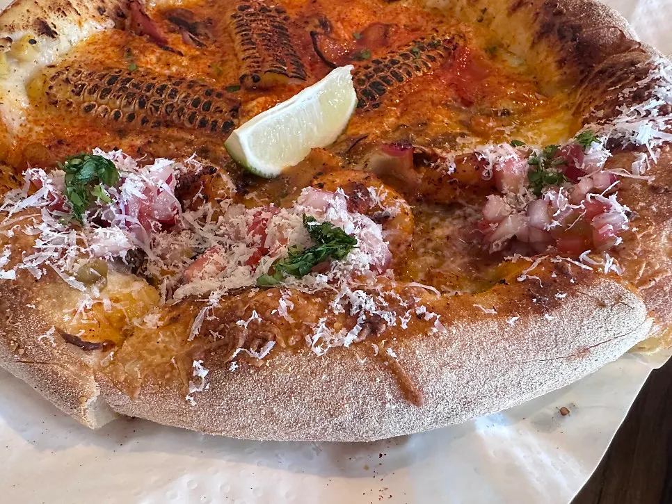 A slice of taco pizza