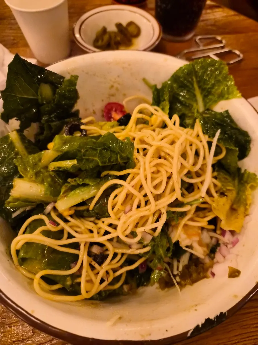 Pasta noodles hidden beneath the salad pasta