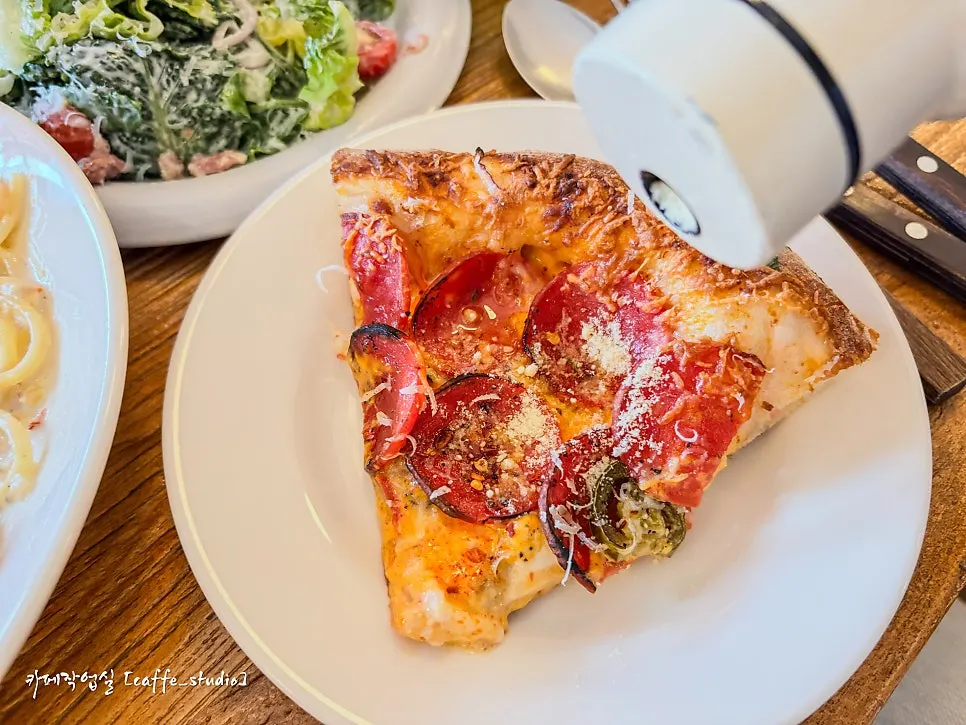 Half-and-half pizza transferred onto a plate