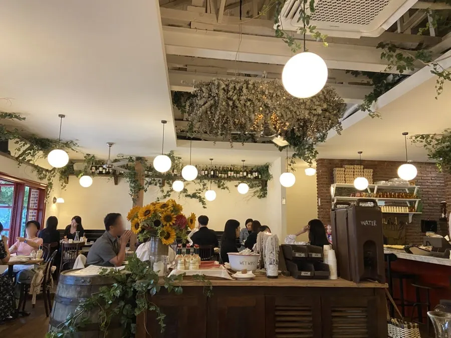 Interior of Low Five Anguk filled with customers
