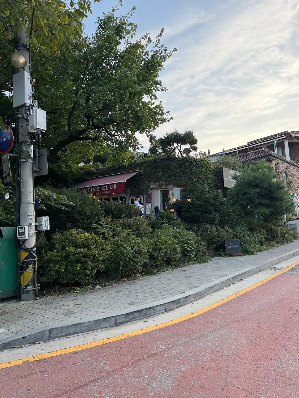Exterior and entrance of the Low Five flagship