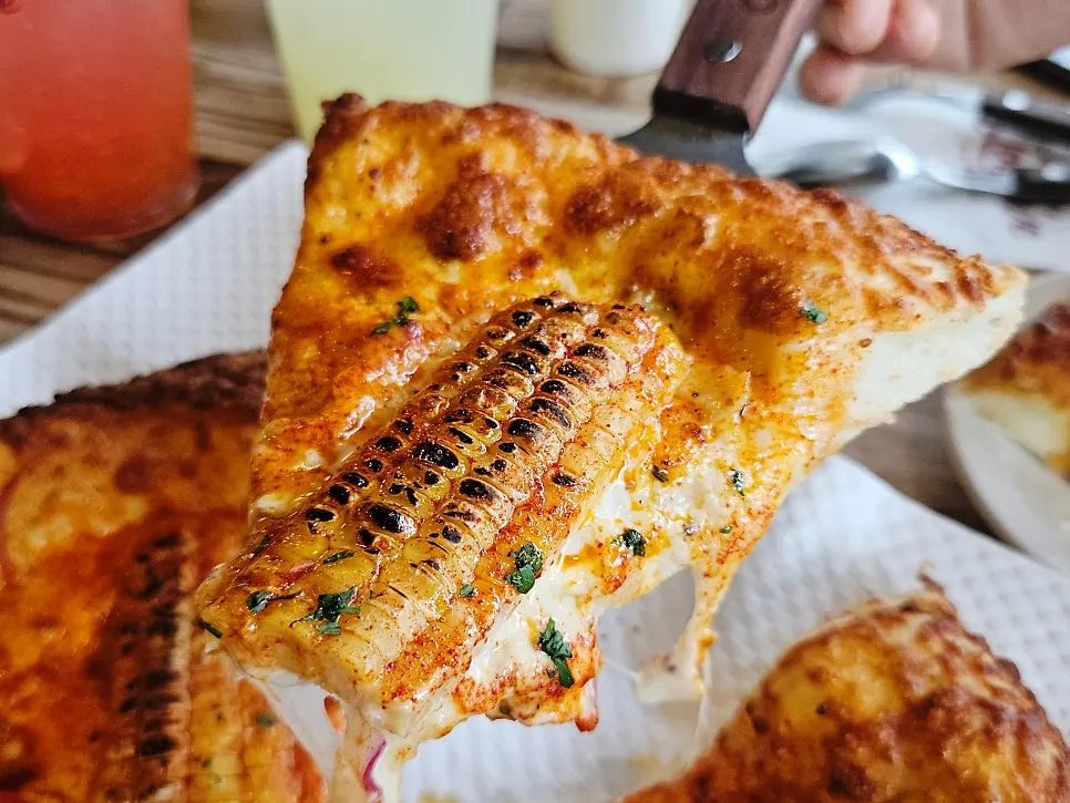 Cross-section of the lasagna piled high with cheese