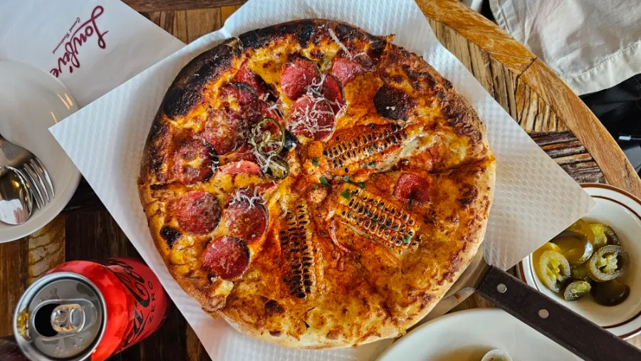 Close-up of a whole pizza at Low Five