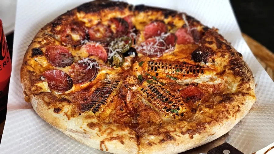 Corn and hot pepperoni half-and-half pizza