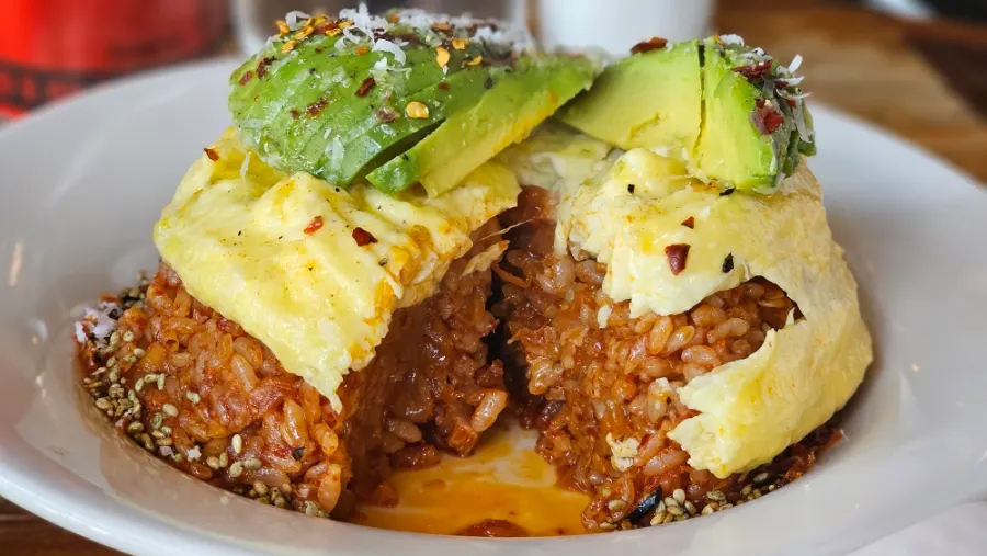 Cross-section of scrambled egg and kimchi fried rice