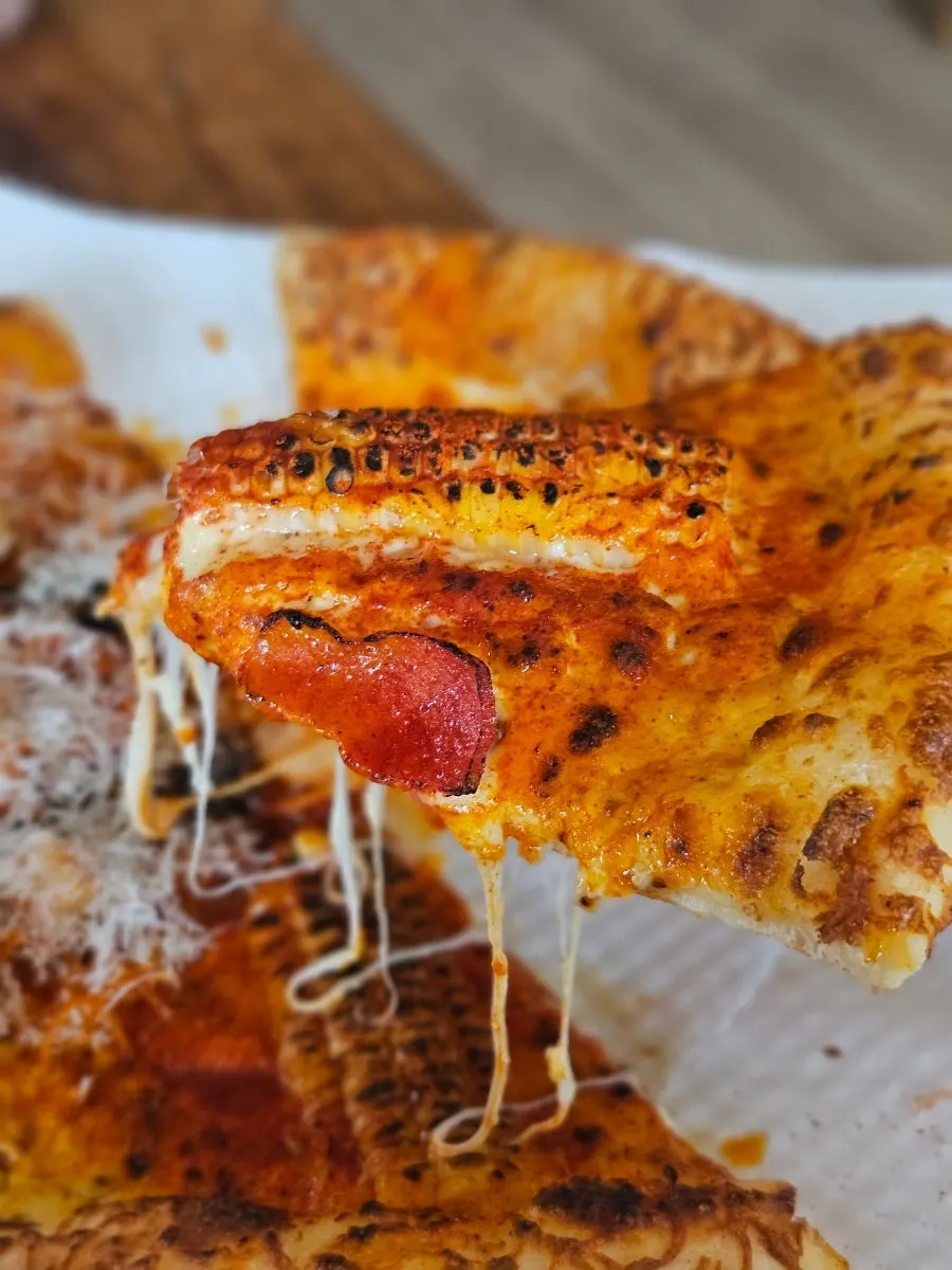Signature corn pizza topped with corn