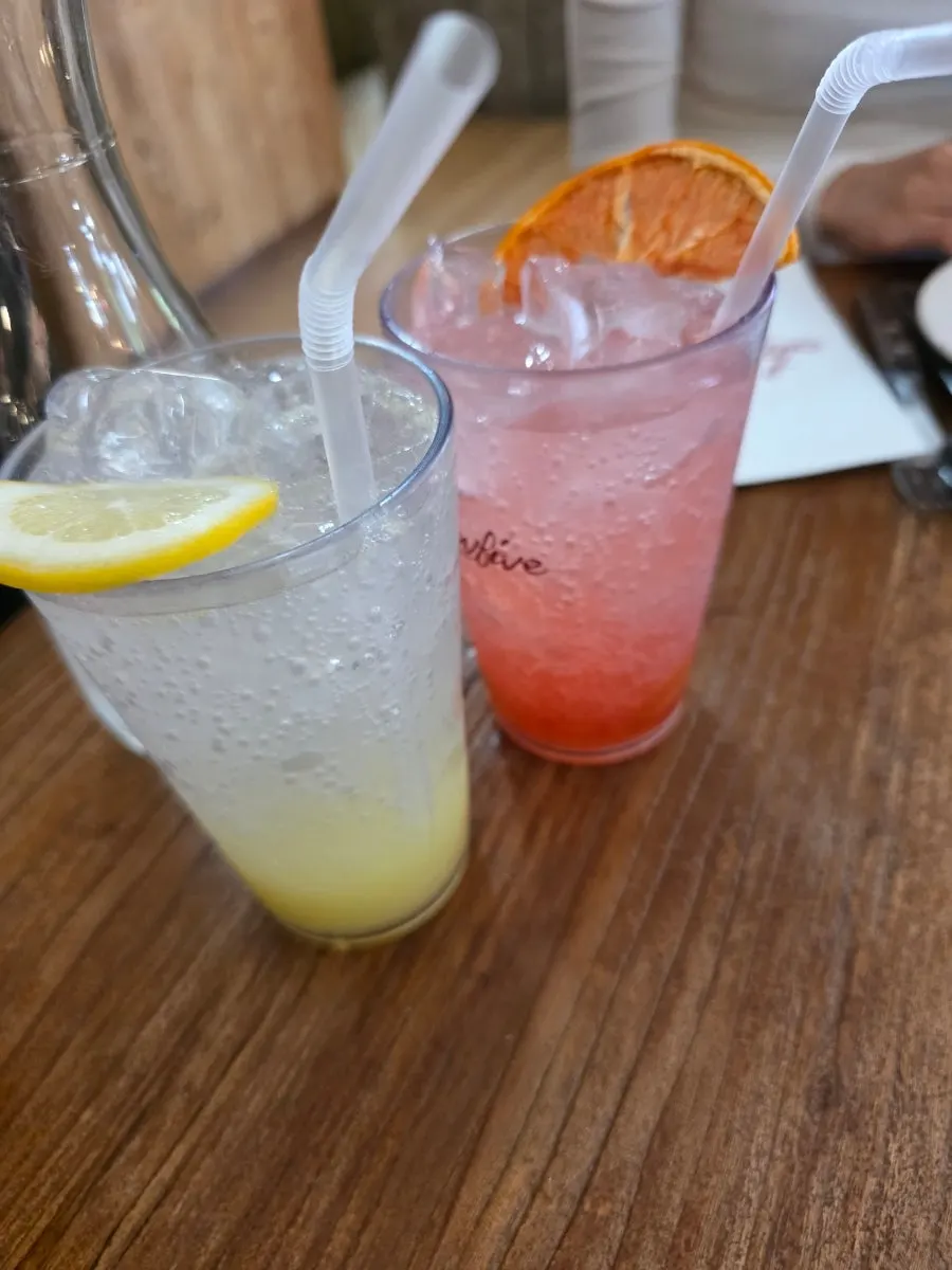 Two glasses of lemon ade and grapefruit ade