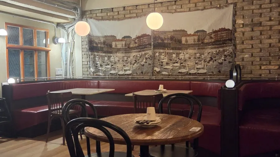 Outdoor seating at Low Five Sinpung with a European feel