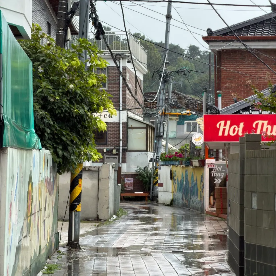 View of Low Five Sinpung in Haenggung-dong on a rainy day