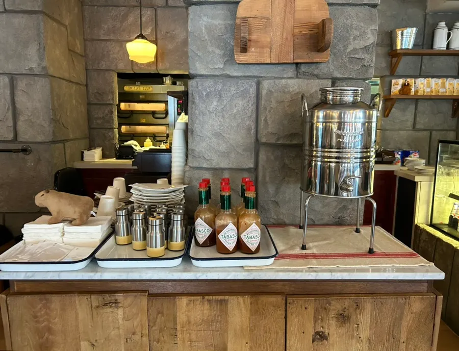 Self-bar with hot sauce and seasonings