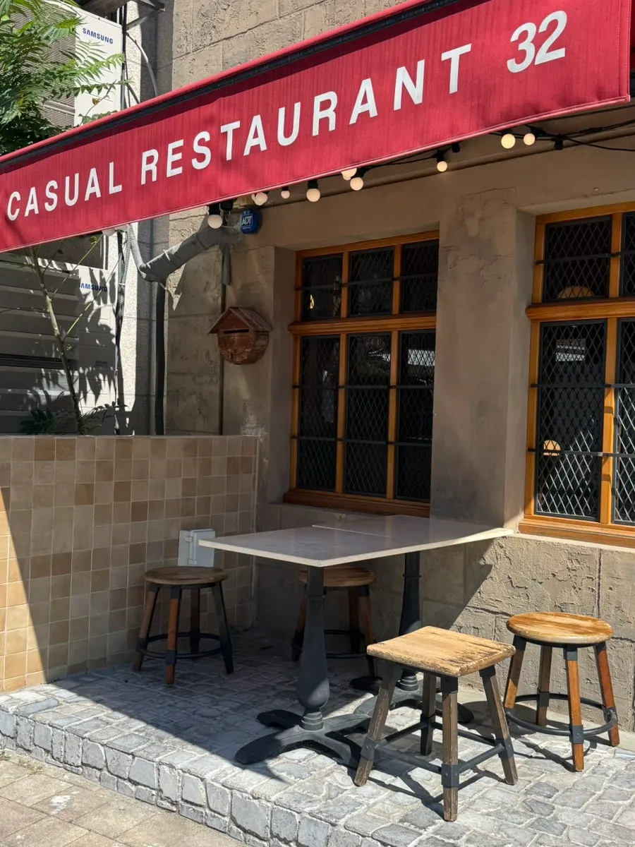 Front of the restaurant with plenty of terrace tables