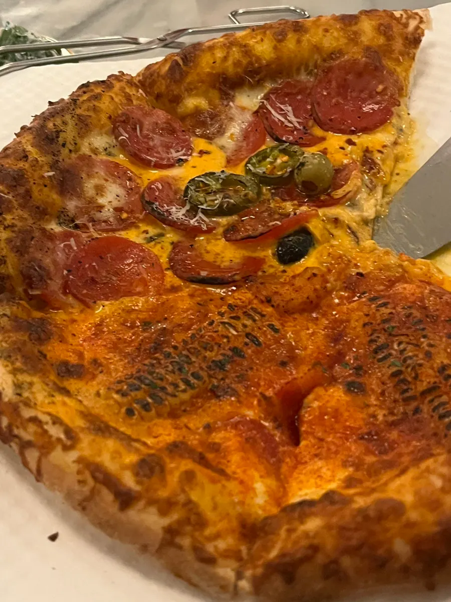Corn and pepperoni half-and-half wood-fired pizza