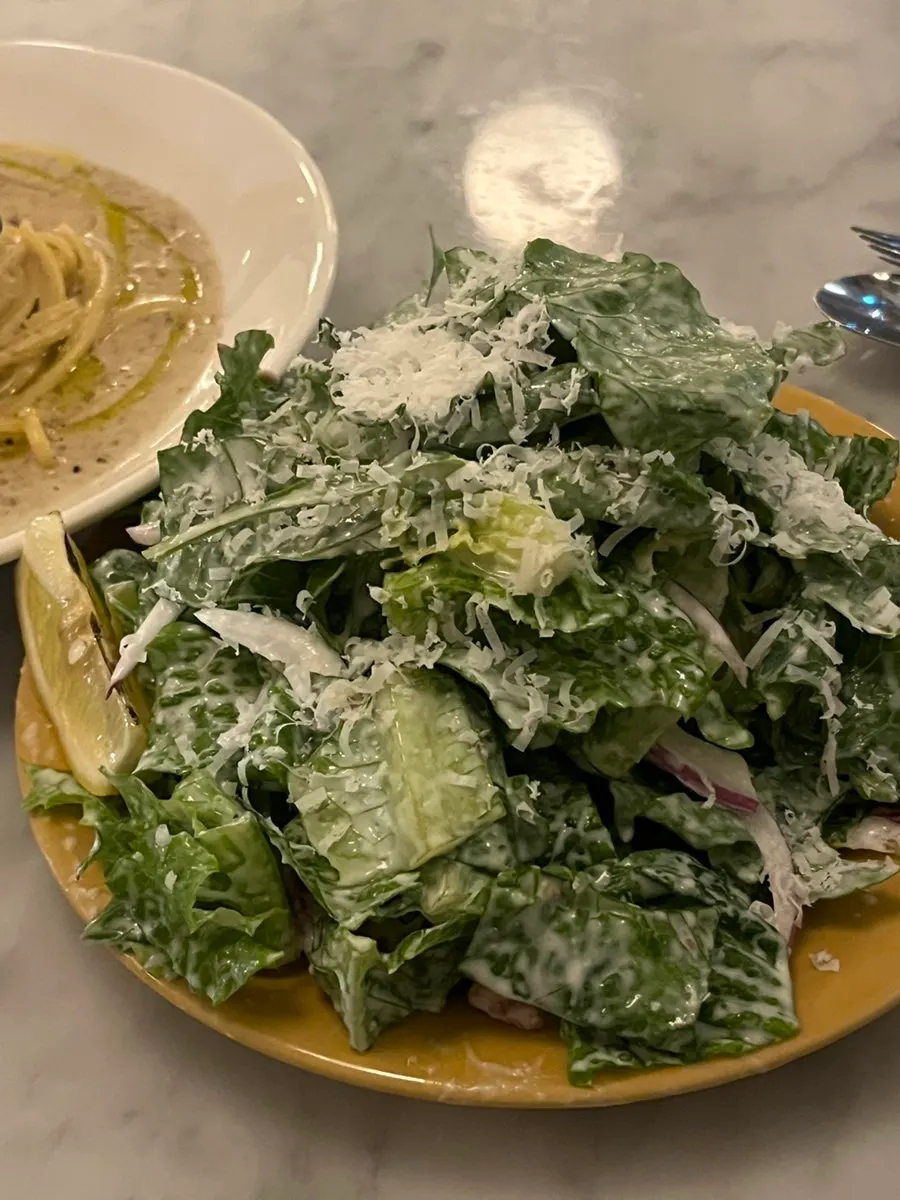 Fresh salad drizzled with lemon