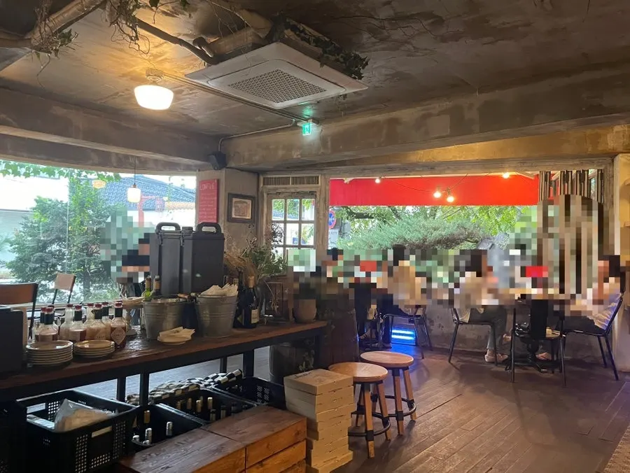 Indoor tables and window seats at Low Five