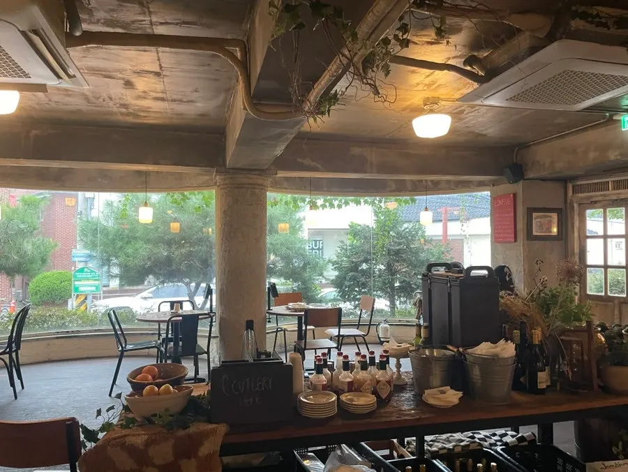 View of seating further inside the restaurant