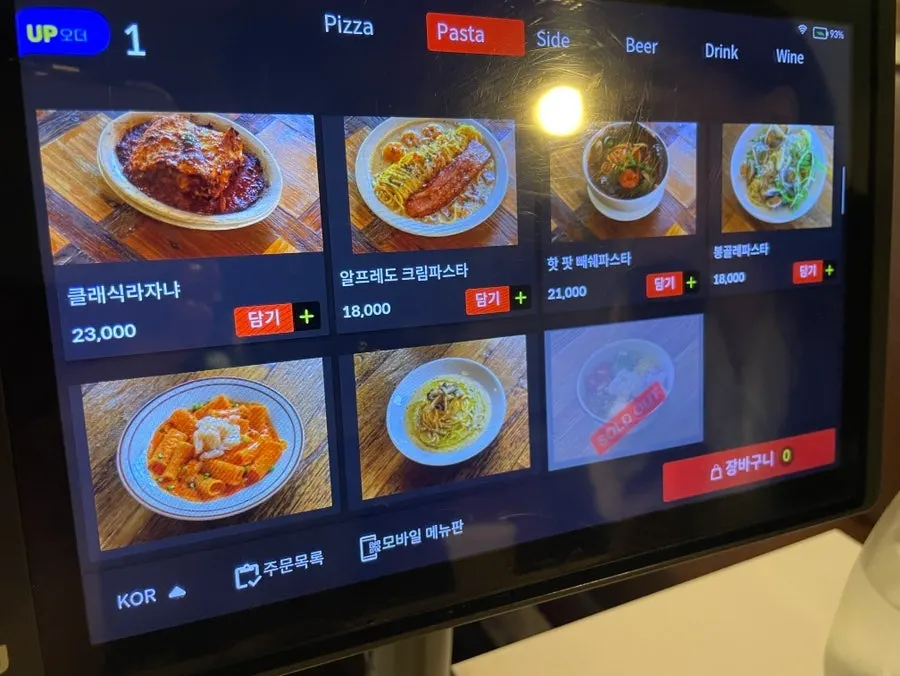 Low Five's pasta and main dish menu board