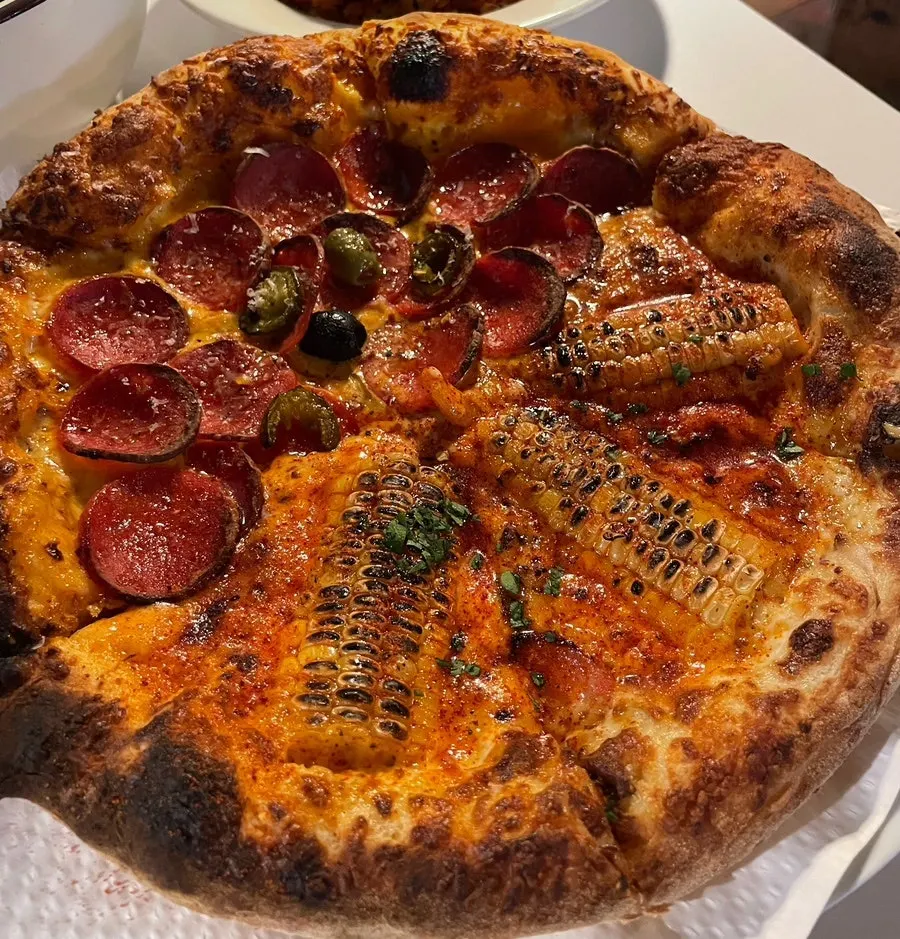 Corn and pepperoni half-and-half pizza