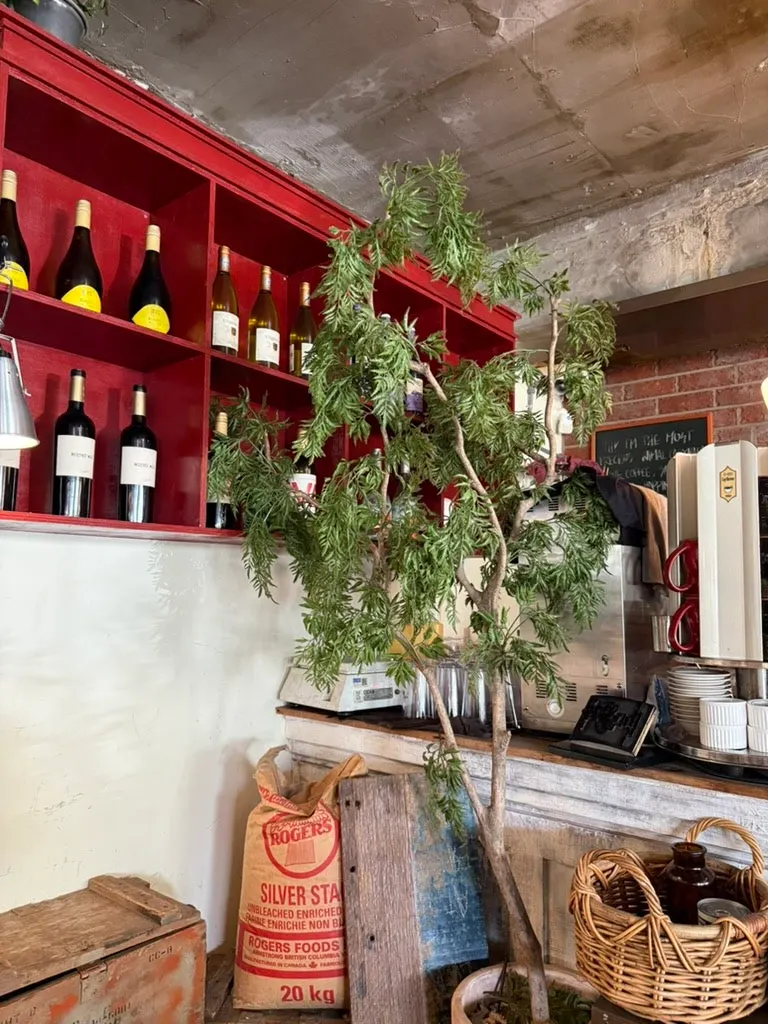 A corner of the store decorated with wine and props