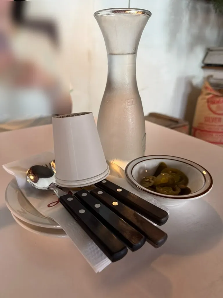 A neatly prepared basic table setting