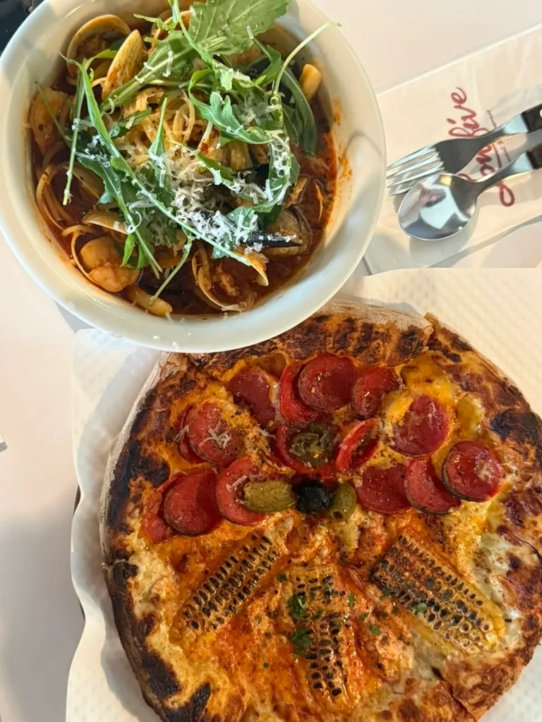 A filling spread of pizza and pasta