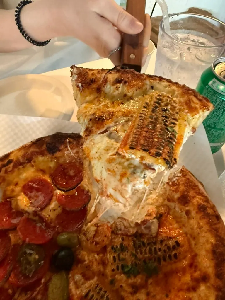 Cross-section of the chewy, crispy pizza dough