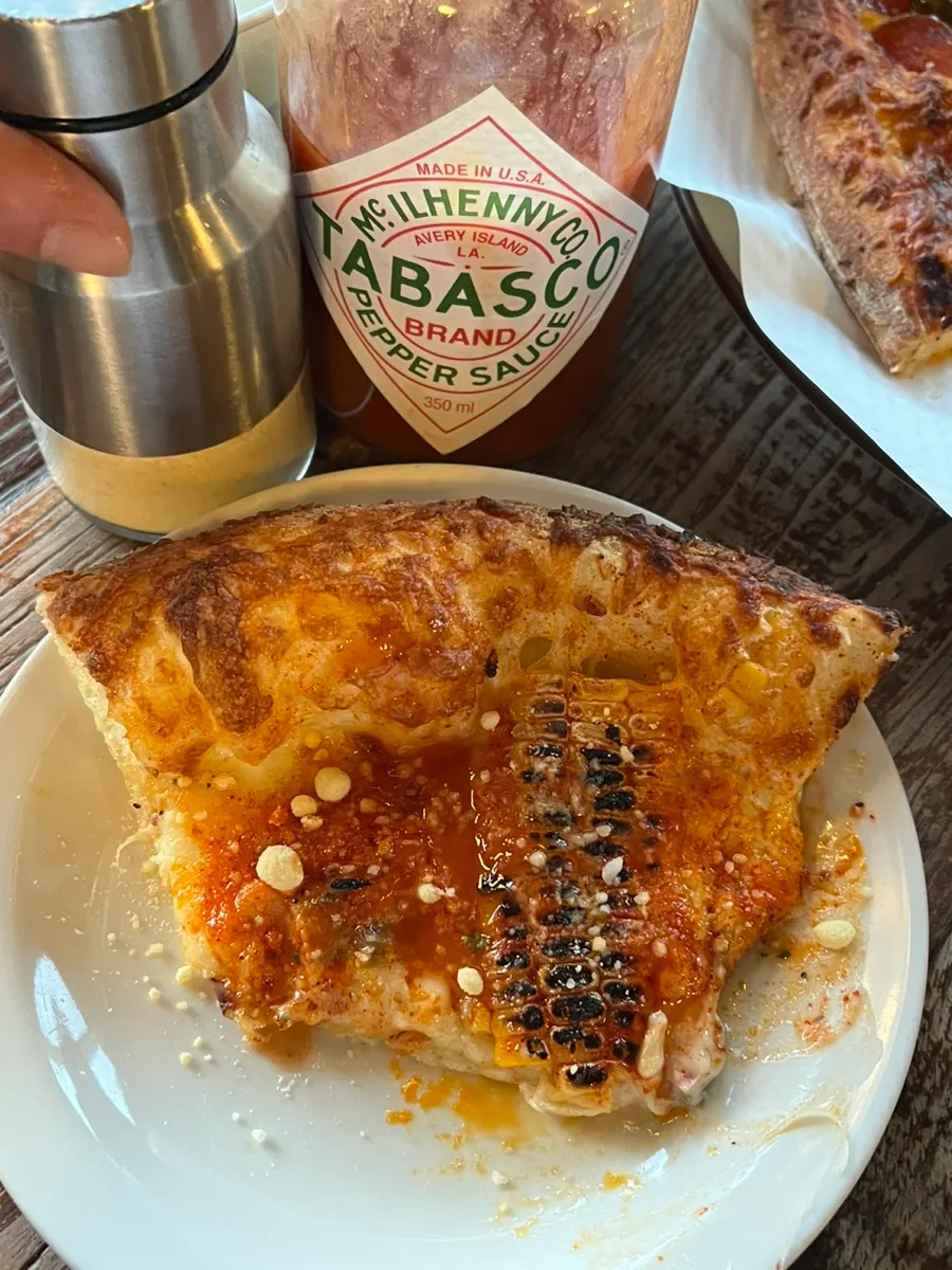 Close-up of the truffle cream base corn pizza