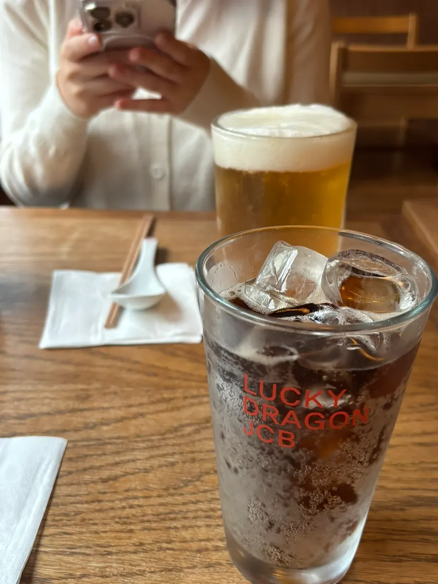 Table with lemon draft beer and Zero Coke