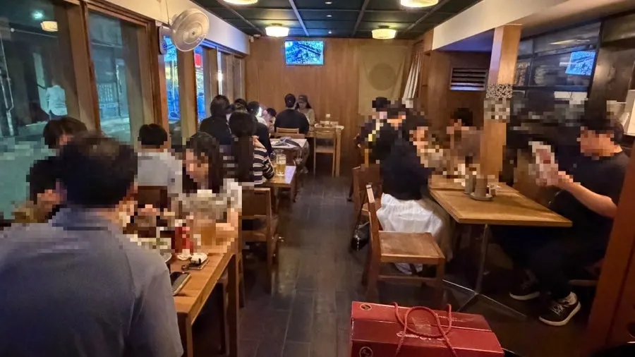 Interior of Lucky Dragon JCB Sindang filled with customers