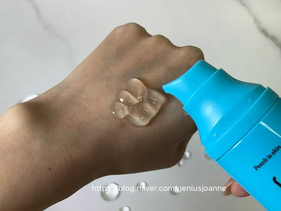 Clear water gel pumped onto the back of a hand