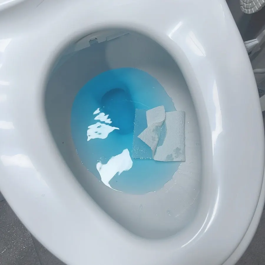 Water gel product on a bathroom shelf