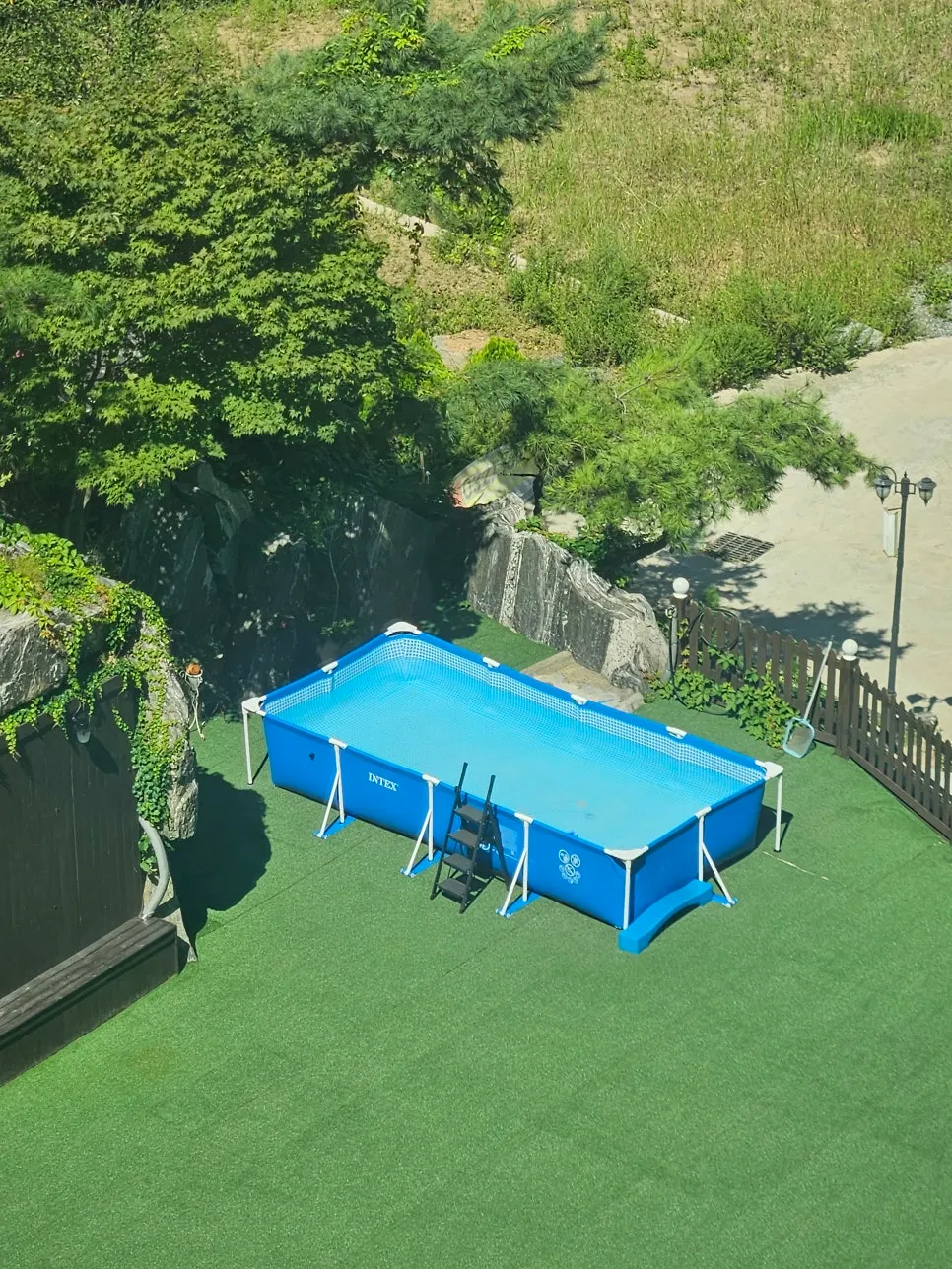 Robot pool cleaner running in the morning pool