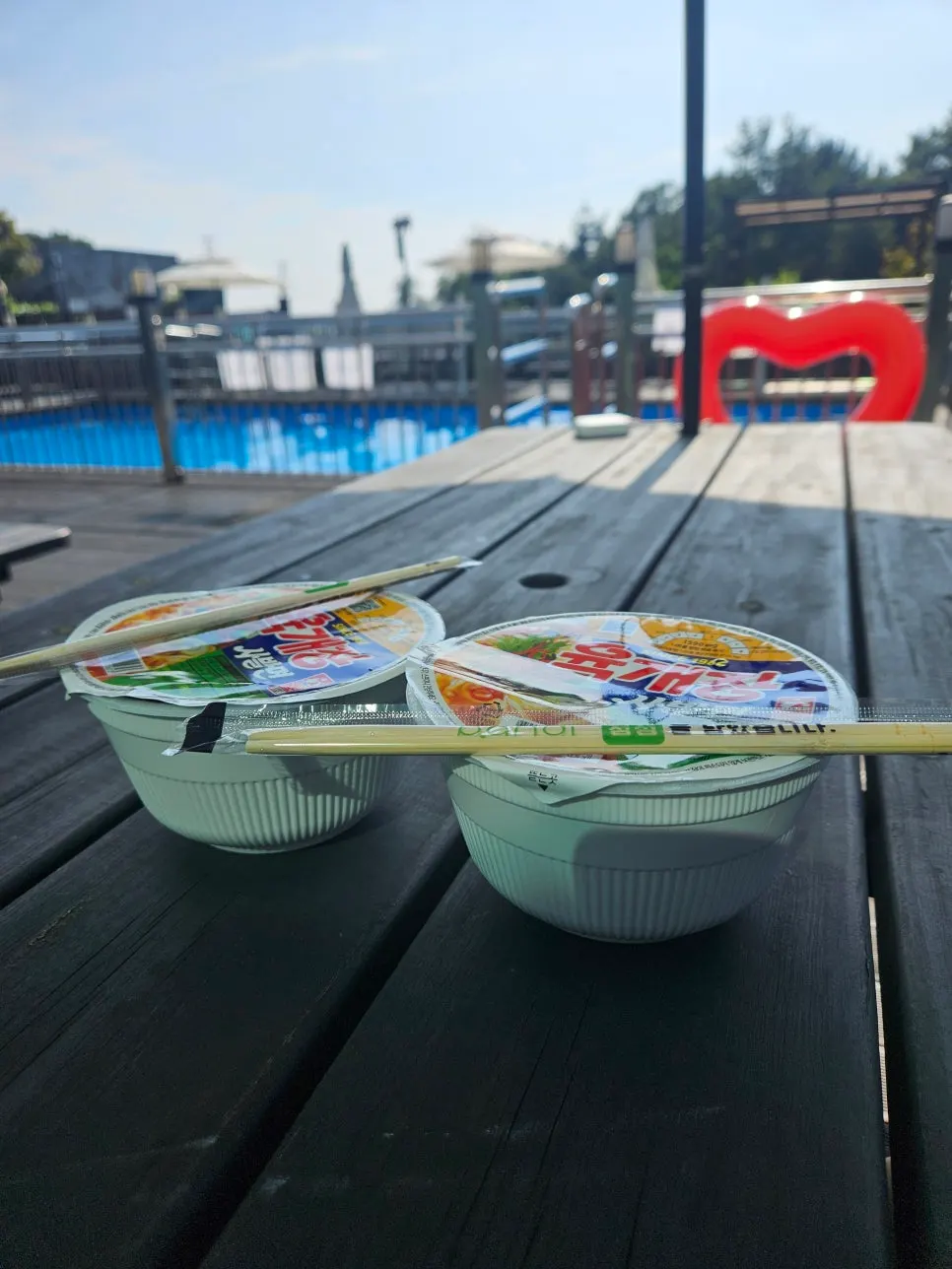 Cup noodles enjoyed on the pool deck