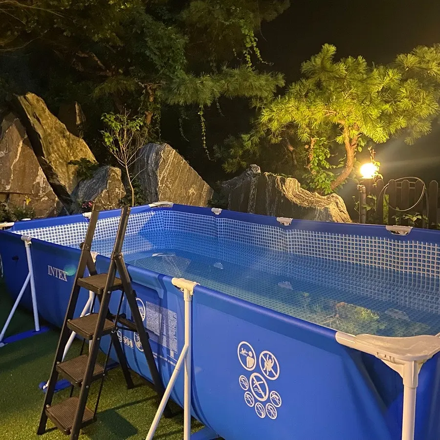 Swimming in the 1.5m-deep outdoor pool