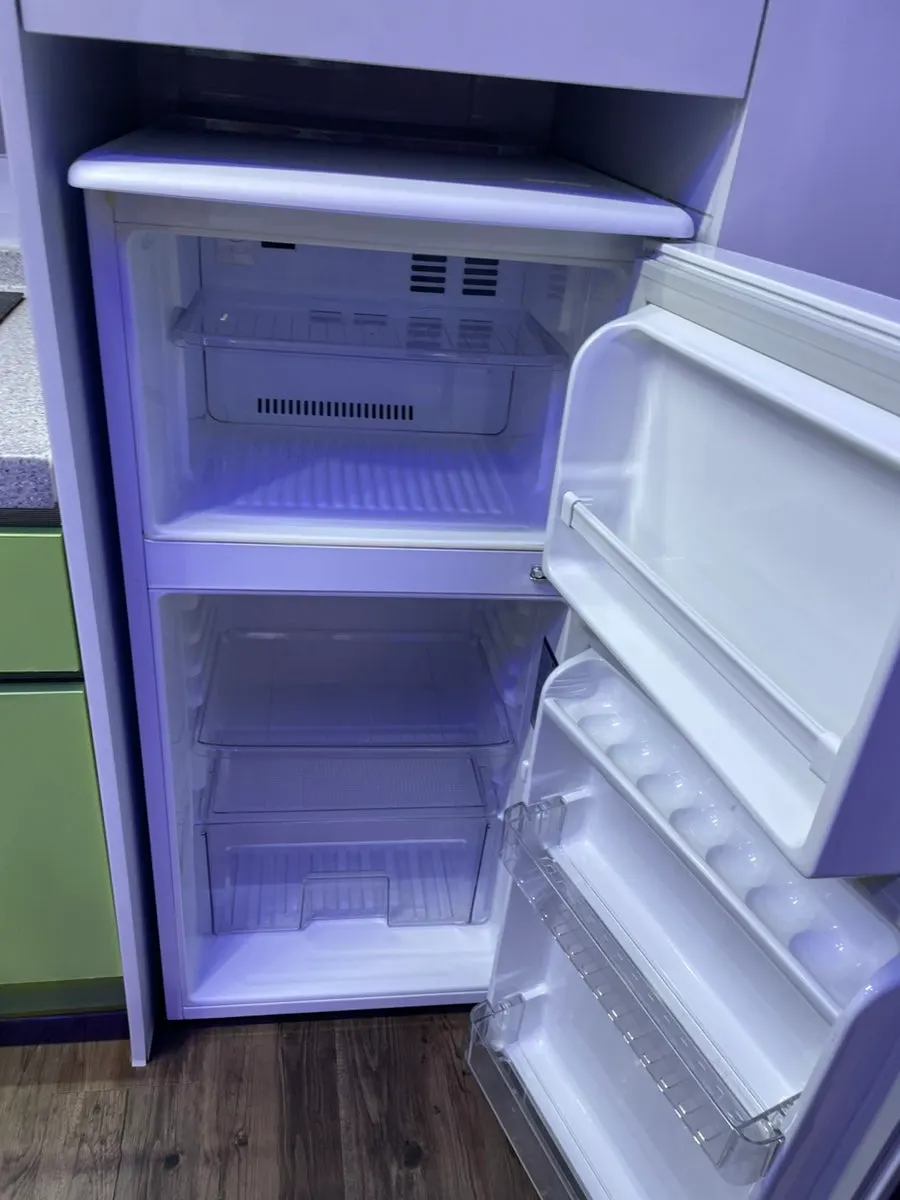 Refrigerator and cooking appliances in the room
