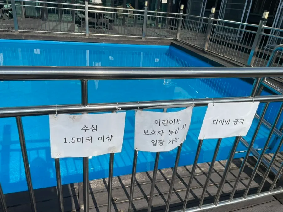 Outdoor pool in front of the outdoor barbecue area