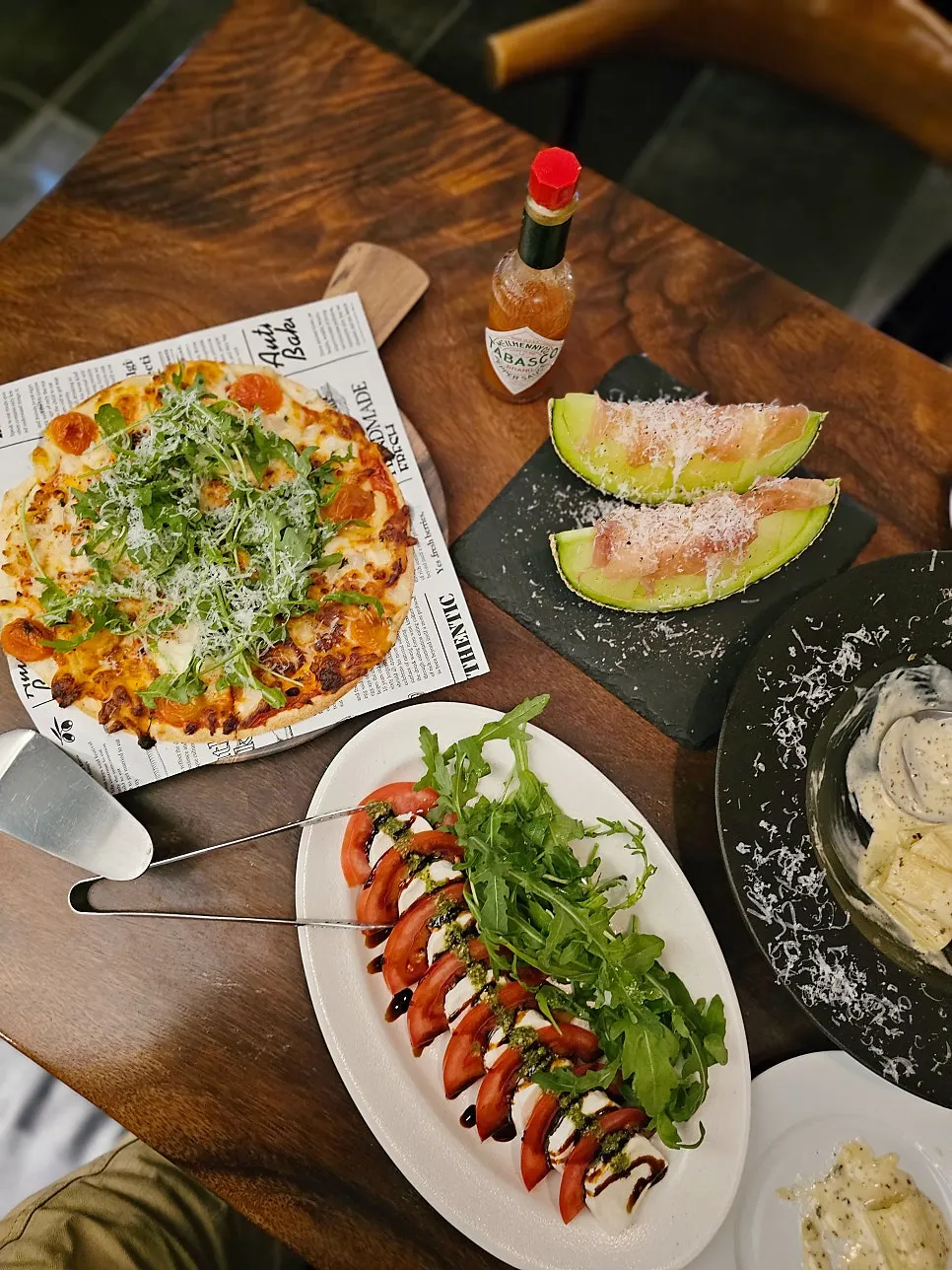 The full spread of ordered dishes at Luna Vine