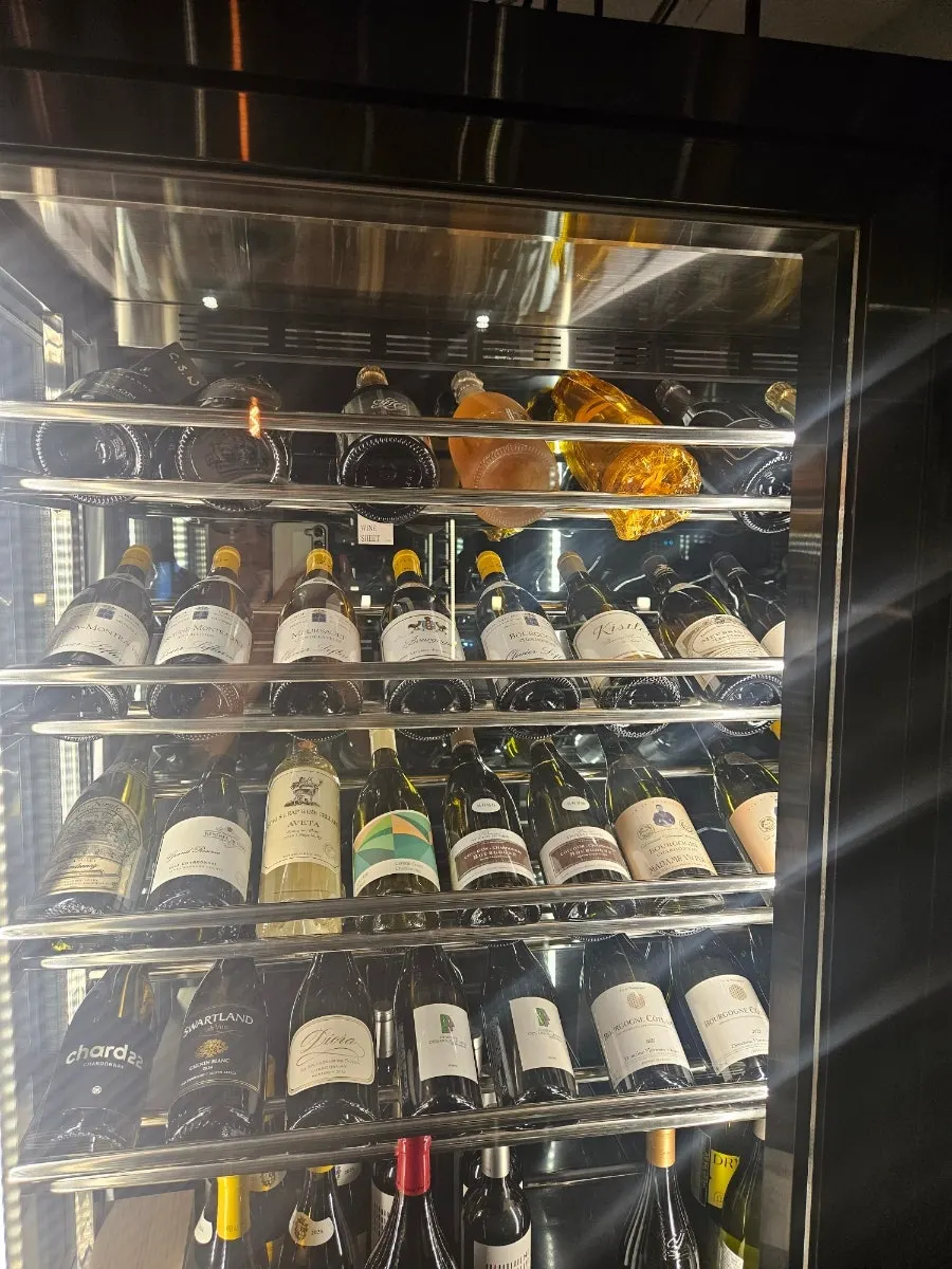 Wine on display in a corner of Luna Vine