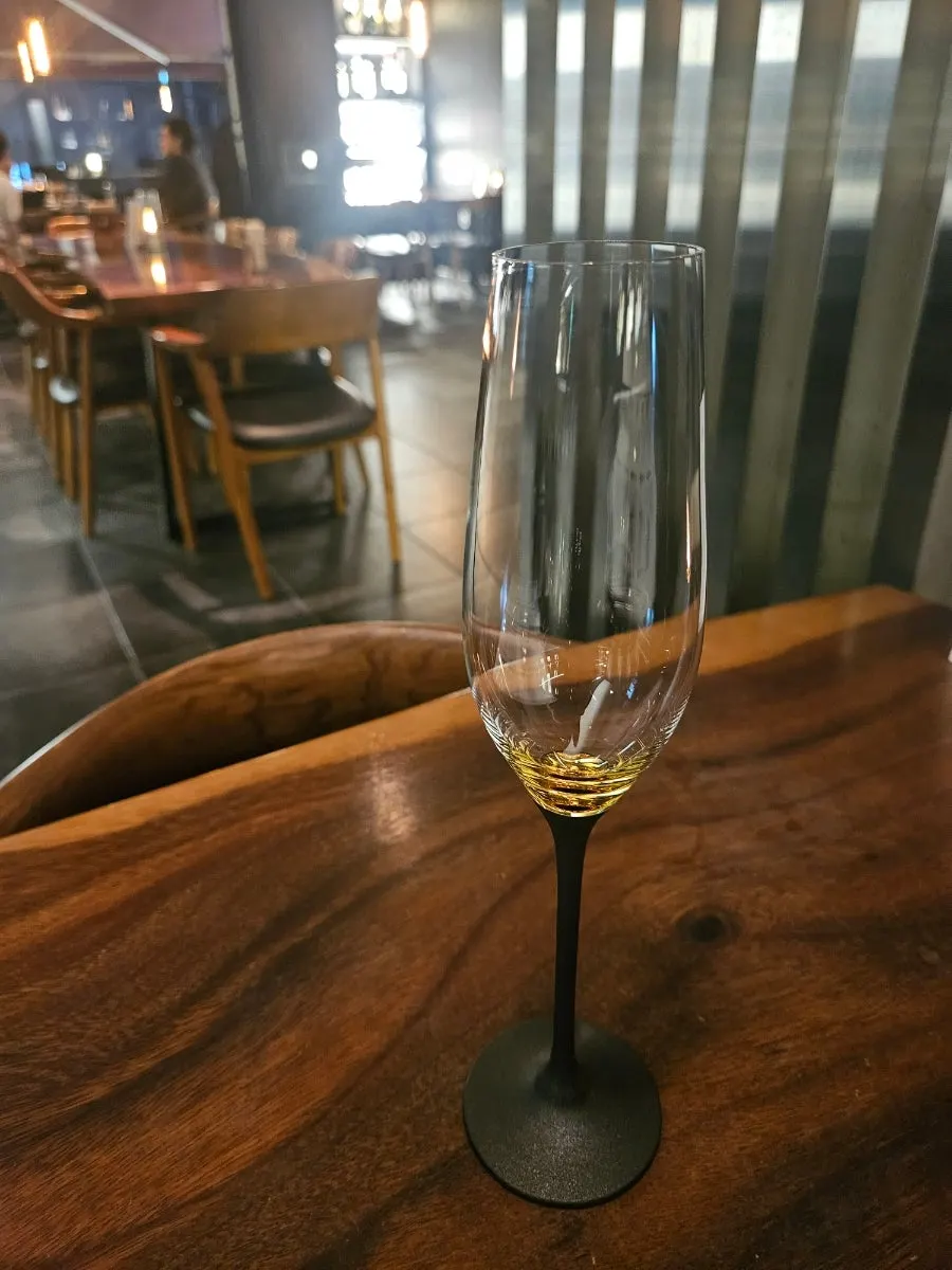 A glass of red wine paired with the meal at Luna Vine