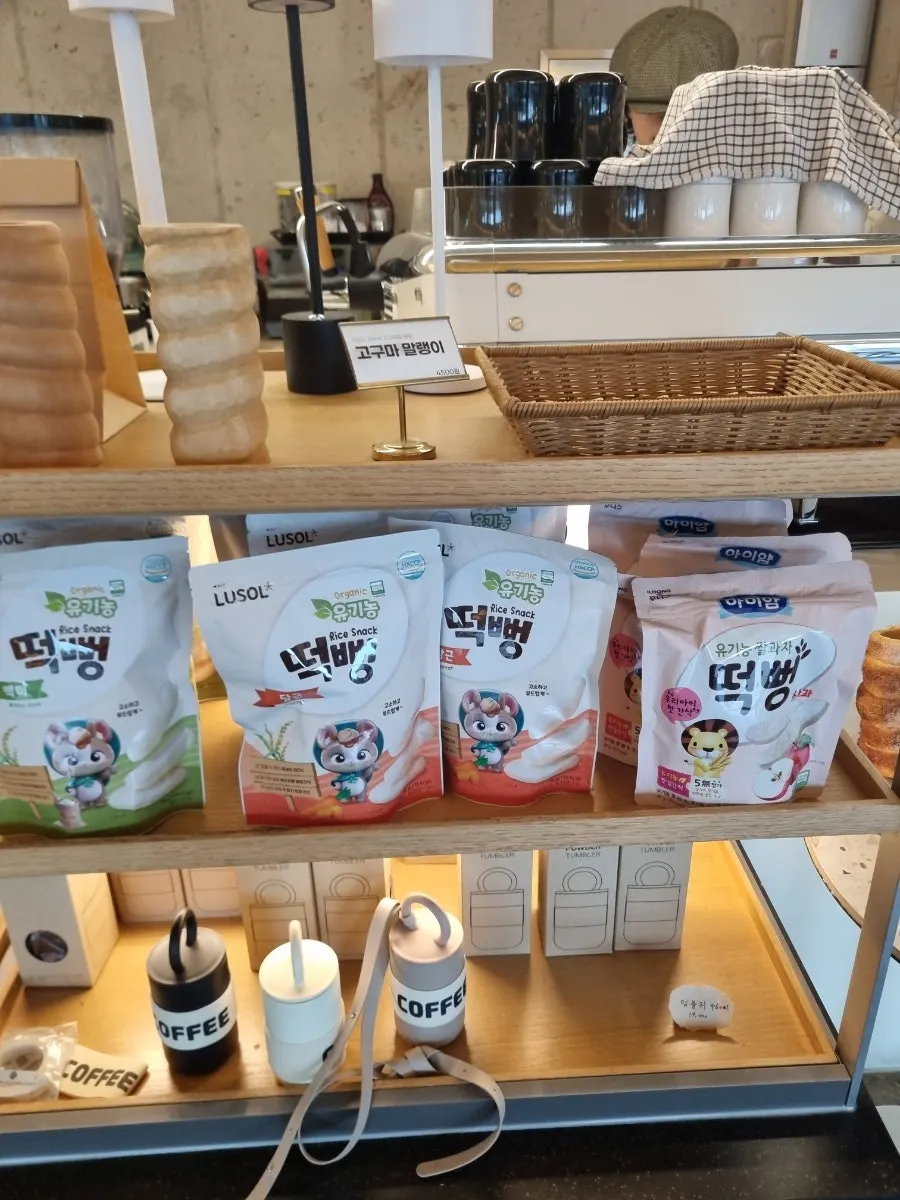 Coffee beans and tumbler display stand on the 1st floor