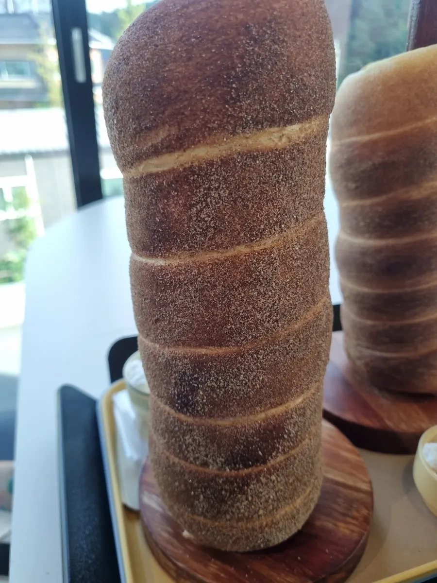 Cross-section of chimney bread paired with coffee